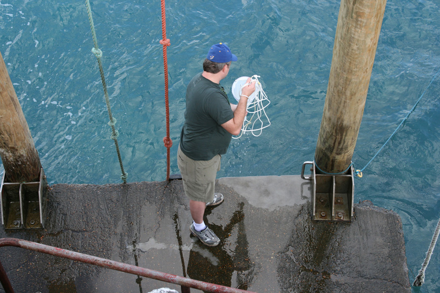 Tom Smith inspects the haul of his plankton net