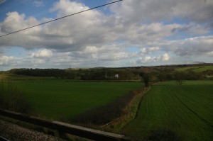 We roll by the English countryside
